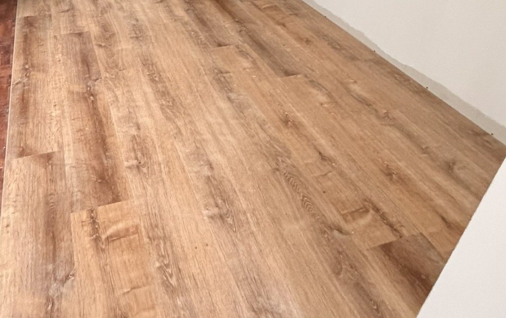 Close-up of finished oak-look plank floor